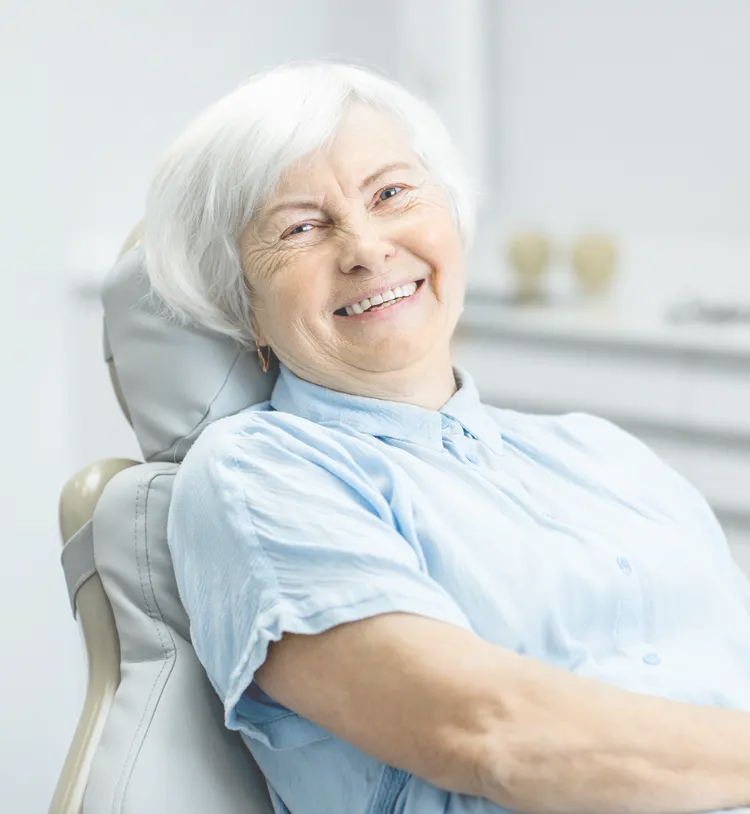 patient in chair smiling